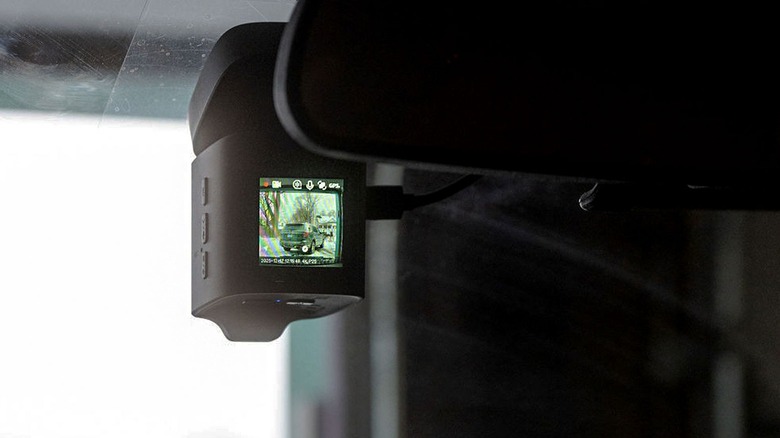 Baseus PrimeTrip VD1 Pro dashcam installed on a windshield