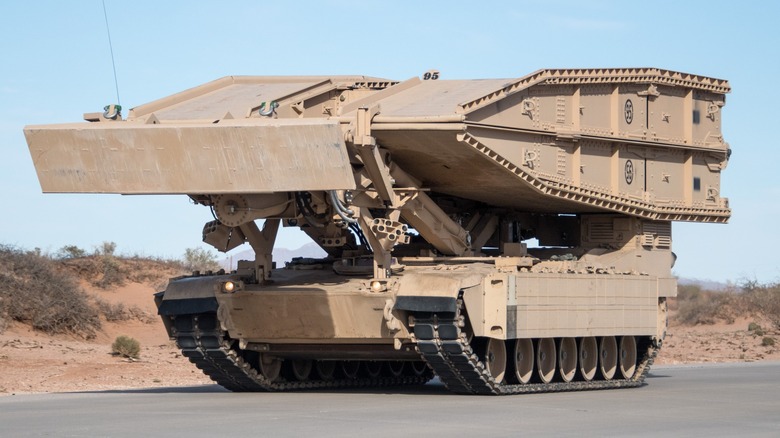 The M1074 Joint Assault Bridge parked on a road in the desert