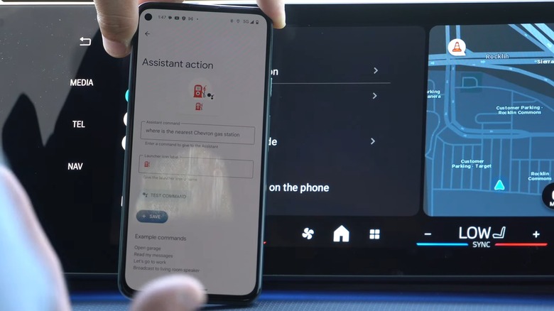 A person setting up an assistant action on Android Auto app on an Android phone