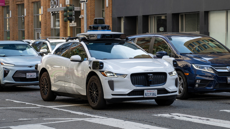 waymo in traffic at crosswalk
