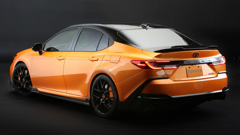 Rear view of orange Toyota Camry GT-S Concept on black background
