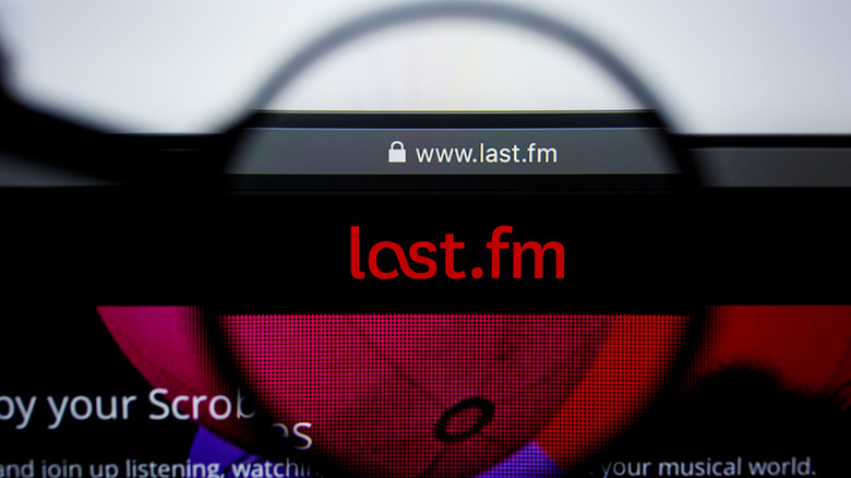 A magnifier showing the logo and url for Last FM.